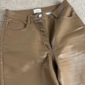 Gorgeous and comfy leather like jeans size 4 perf condition